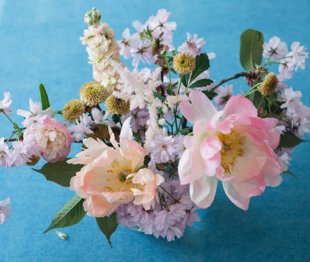 istock Pastel cut flowers in a glass vase 980371624