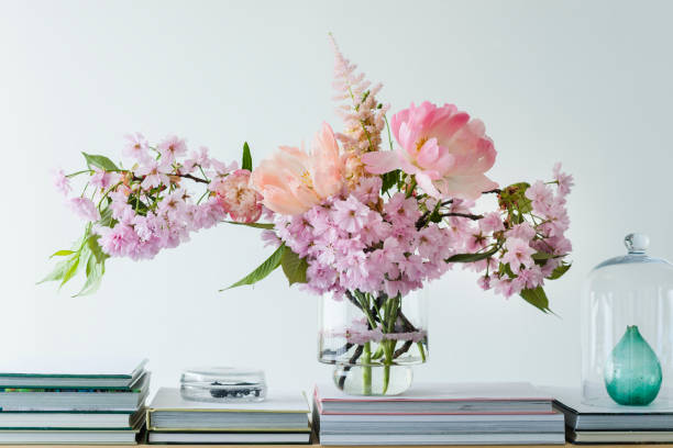 Pastel cut flowers in a glass vase Bunch of Flowers, Bouquet, Glass - Material, Rose - Flower, Sweden beautiful bouquet of cherry blossoms in vase on table stock pictures, royalty-free photos & images