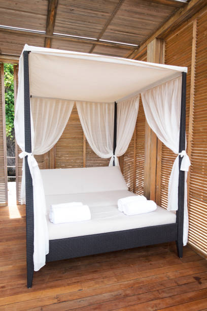 istock Romantic gazebo lounge at a tropical seaside 980375080