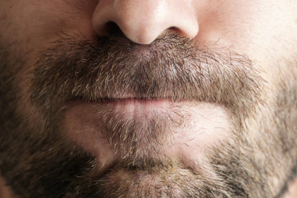 istock Close-up of man's lips 980383814