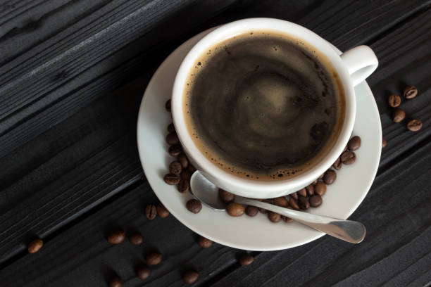 istock coffee with foam and coffee beans 980390018