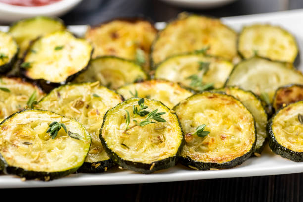 zucchini chips and sauces healthy snack - zucchini chips and sauces courgette stock pictures, royalty-free photos & images