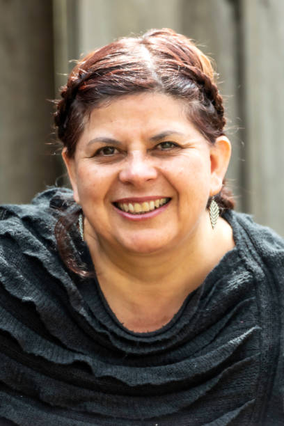 istock Smiling mature woman looking at the camera 980416770
