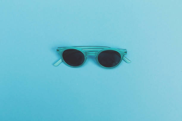 istock Cool sunglasses on a baby blue background 980427928