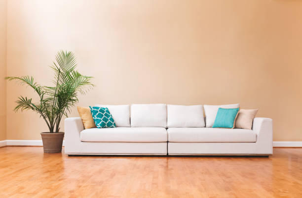istock White couch in a large luxury home 980428076
