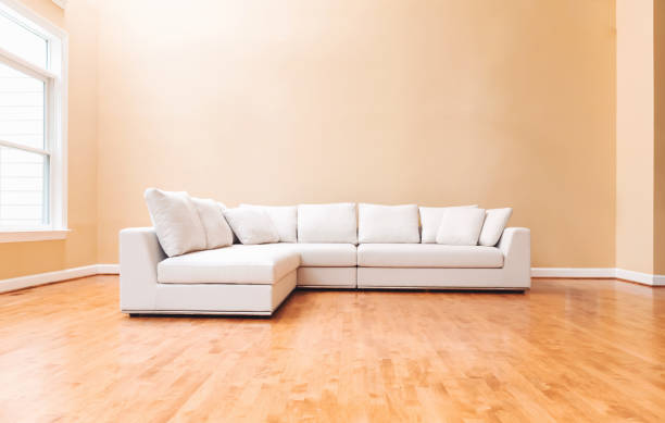 White couch in a large luxury home stock photo