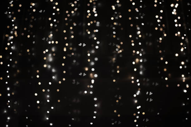 istock Shiny hearts and abstract lights background 980428096
