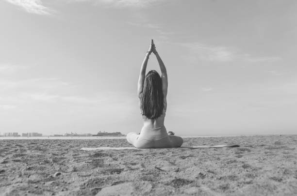 istock the girl doing yoga, doing asanas 980428564