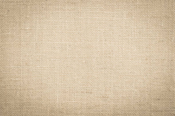 hessian sackcloth woven fabric texture background in beige cream brown color - gunny sack imagens e fotografias de stock