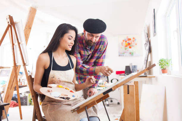 istock Student and teacher working in atelier 980435844