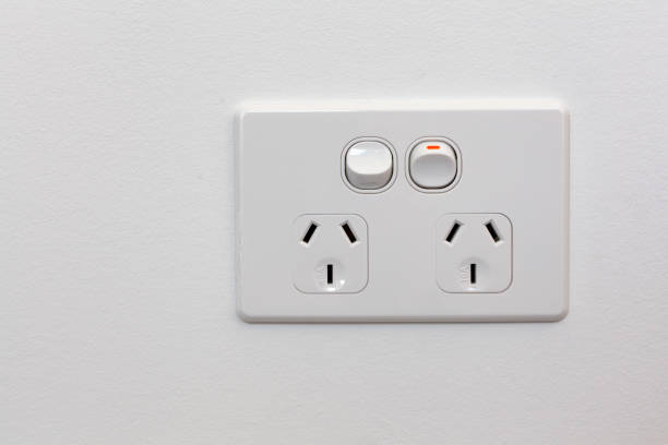 istock Modern Australia double power outlet on white wall 980450670