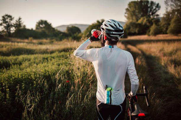 istock Cyclist taking a rest after long ride 980451890