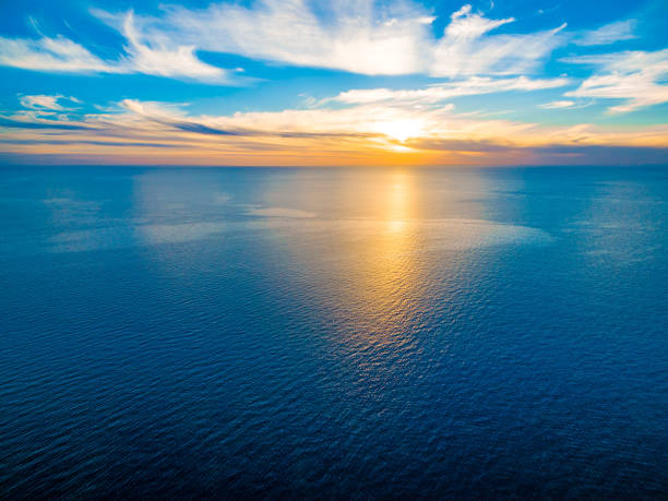 istock Minimalist seascape sunset - over tranquil sea 980460982