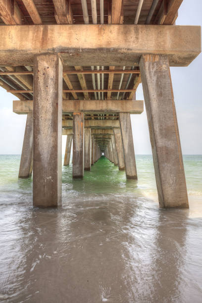 istock Under the Naples Pier with a blue sky 980462020