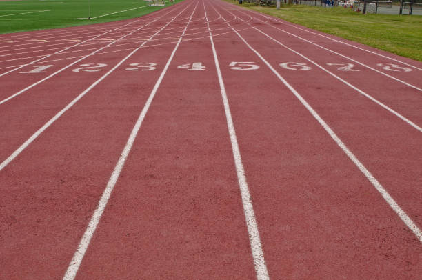 istock Running lanes on a track 980487304