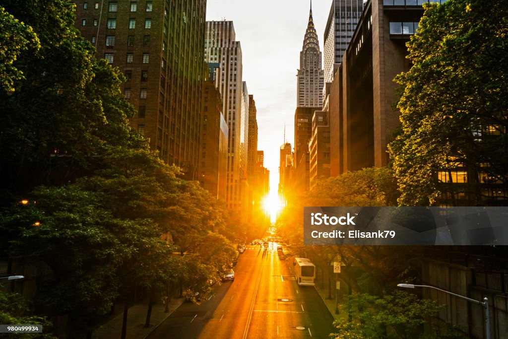 The Manhattan Henge Sunset in New York city New York City Stock Photo