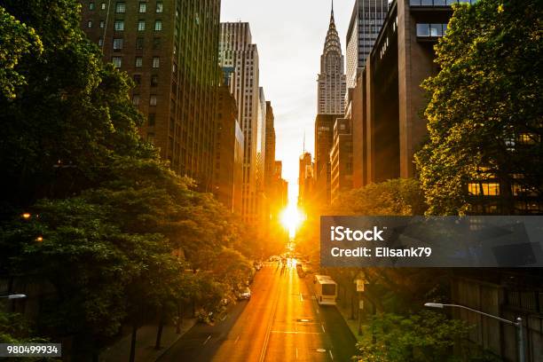 The Manhattan Henge Stock Photo - Download Image Now - New York City, Manhattanhenge, Sunset