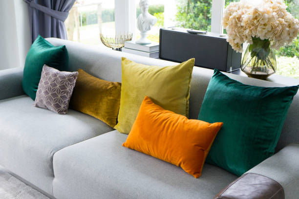 istock living room with grey sofa and colorful pillows 980509506