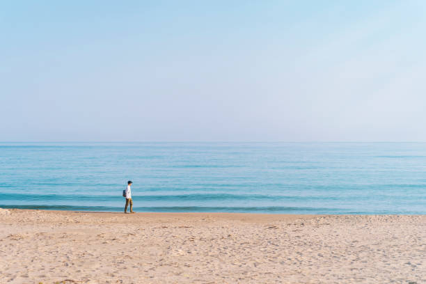 Men enjoys traveling in Tottori sand dunes in Japan