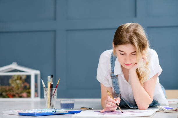 istock leisure art talent expression girl drawing picture 980545866