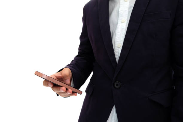 Business man using a smart phone isolated on white background Business man using a smart phone isolated on white background isolated on whie stock pictures, royalty-free photos & images