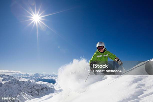 Happy Female Skier With Mountain View Stock Photo - Download Image Now - Skiing, Powder Snow, Ski