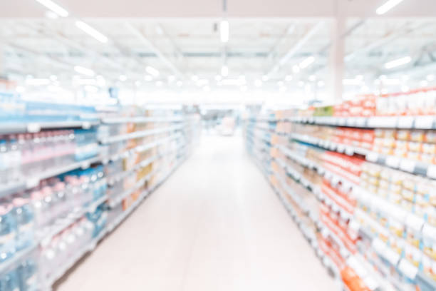 istock Blurred background-abstract blur shopping mall store interior. 980554636