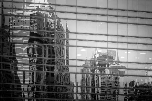 istock Modern office building detail, glass surface with B&W color 980592688