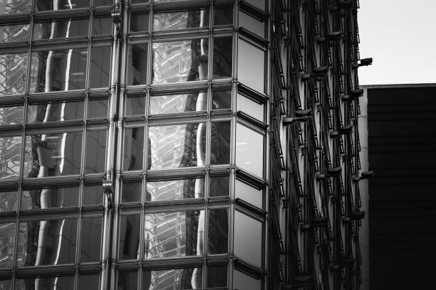 istock Modern office building detail, glass surface with B&W color 980592706