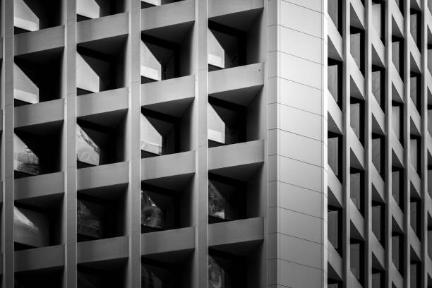 istock Modern office building detail, glass surface with B&W color 980592840