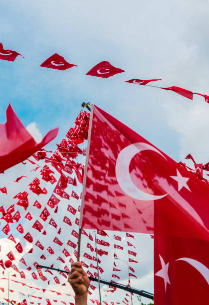 Low Angle View Of Turkish Flags Against Sky