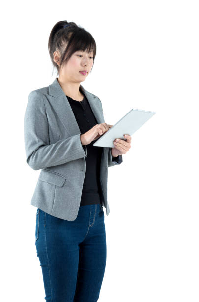 istock Businesswoman using digital tablet on white background 980622172