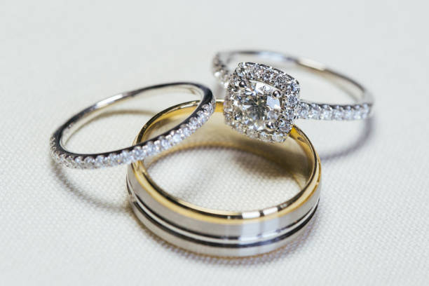 Wedding rings on white background stock photo