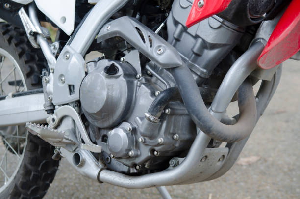 istock Motorcycle engine closeup at field of racing 980624158