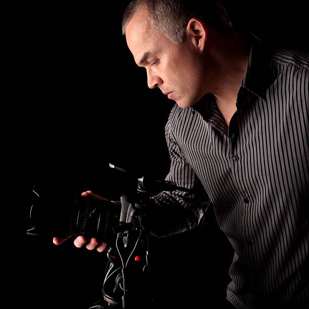 istock Handsome middle aged man taking a photo 98063073