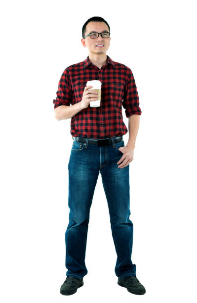 Smiling man holding a coffee cup.