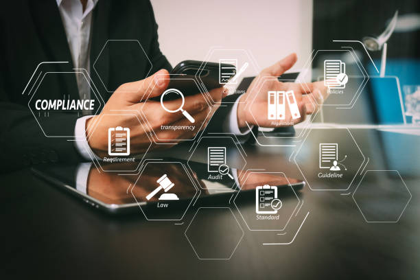 istock businessman working with smart phone and digital tablet and laptop computer in modern office with glass reflected view 980642616