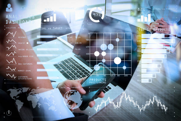 istock Businessman making presentation using smart phone with his colleagues and business tablet digital computer at the office as concept 980646728