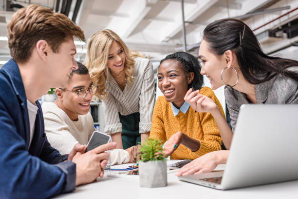 istock happy young business partners working together at conference hall 980650650