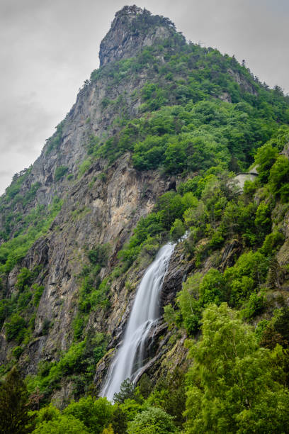 istock Waterfall and mountain in nature 980650738