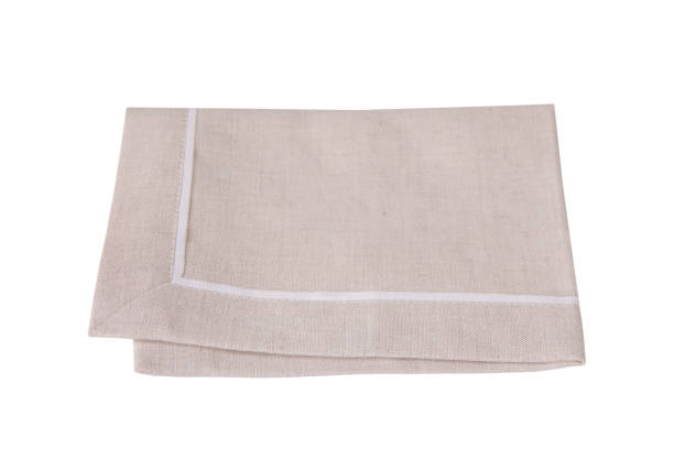 istock Beige napkin isolated on white background, business concept 980651526