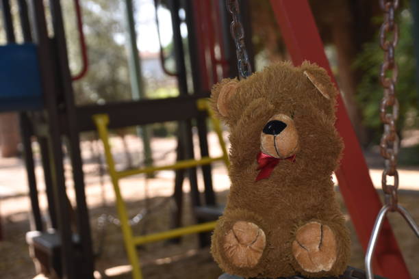 istock Play hide and seek with a teddy bear 980651614