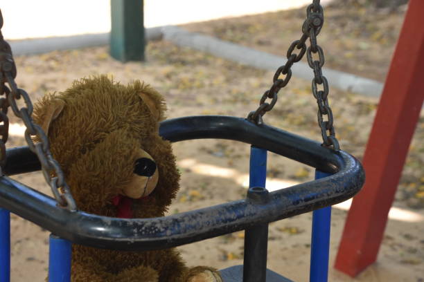 istock Play hide and seek with a teddy bear 980654464