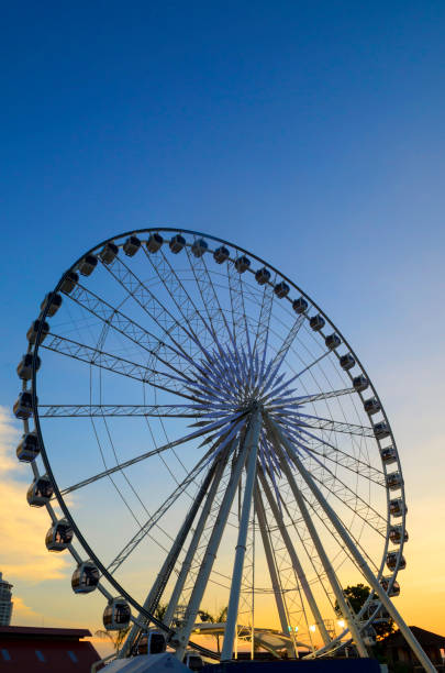 istock Beautiful large Ferris wheel. And the blue sky. 980655688