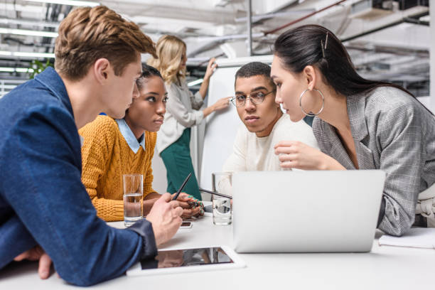 istock young multiethnic managers working together at conference hall 980659214