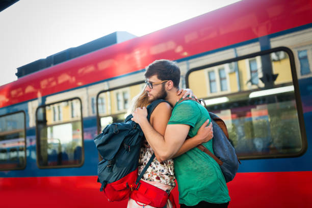 istock Beautiful couple parting at train station 980669042