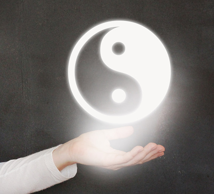 Woman with Glowing Yin Yang Sphere Icon