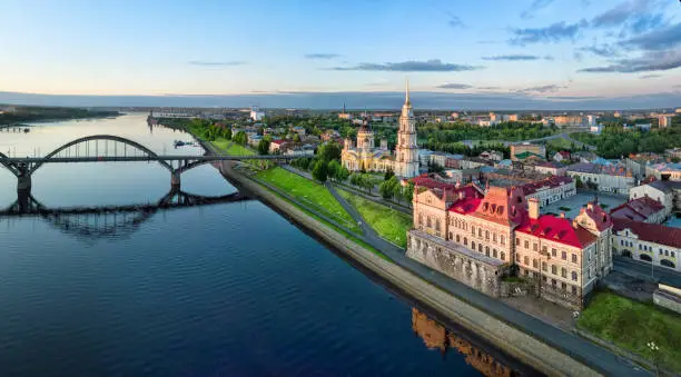 Aerial cityscape of Rybinsk: Volga river embankment, cathedral and bridge