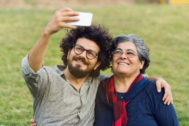 istock Mother and son taking selfie 980698056