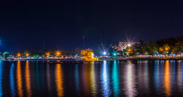 Nongprajak lake at night  Udonthani,Thailand Nongprajak lake at night  Udonthani,Thailand udon thani stock pictures, royalty-free photos & images